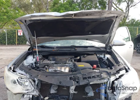 2014 Toyota Camry Le z USA, uszkodzony, nr VIN 4T1BF1FK1EU326083